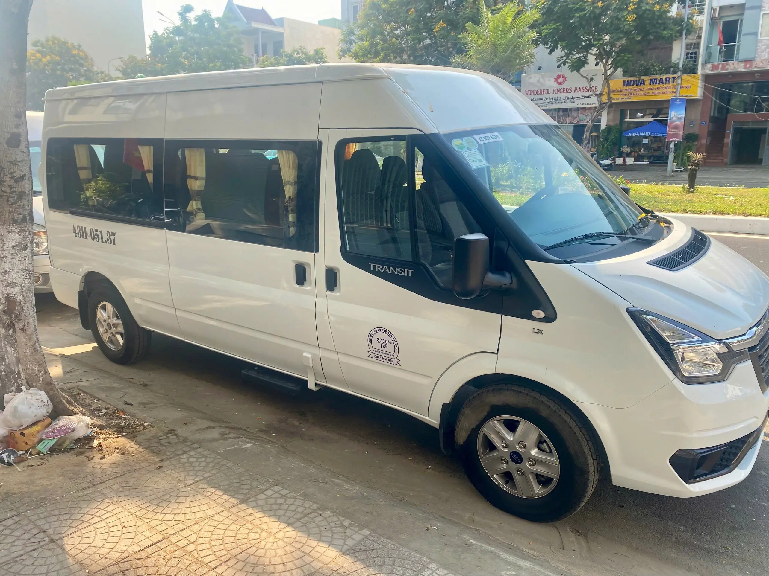 16-seater shared vehicle used for Lao Bao border visa run trips
